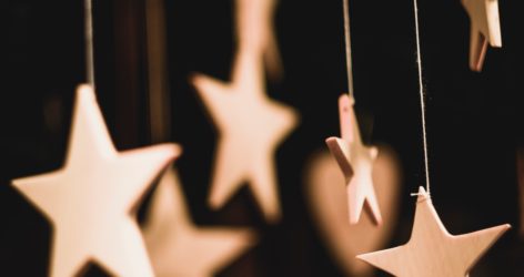shallow focus photo of wooden stars hanging decor